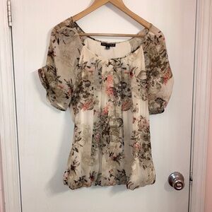 Sara Michelle cream floral top with orange accents and cinched waist